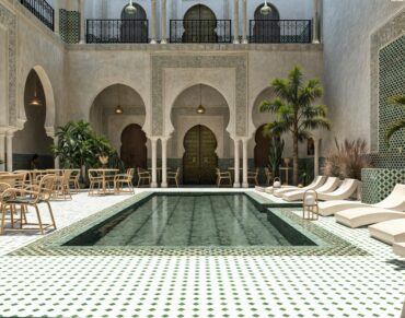 Luxury Moroccan spa in Marrakech offering traditional hammam and argan oil massages amidst tranquil palm gardens for a wellness retreat.